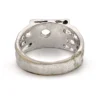 Vintage Uncas men’s Modernist white gold plated ring with open shoulders and a round faceted crystal.