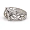 Vintage Uncas men’s Modernist white gold plated ring with open shoulders and a round faceted crystal.