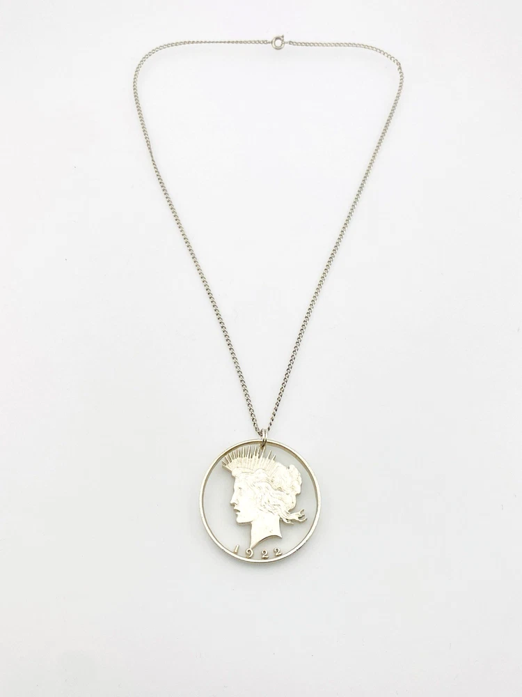 Hand cut Peace Dollar silver coin pendant full view
