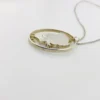 Hand cut Peace Dollar silver coin pendant detail