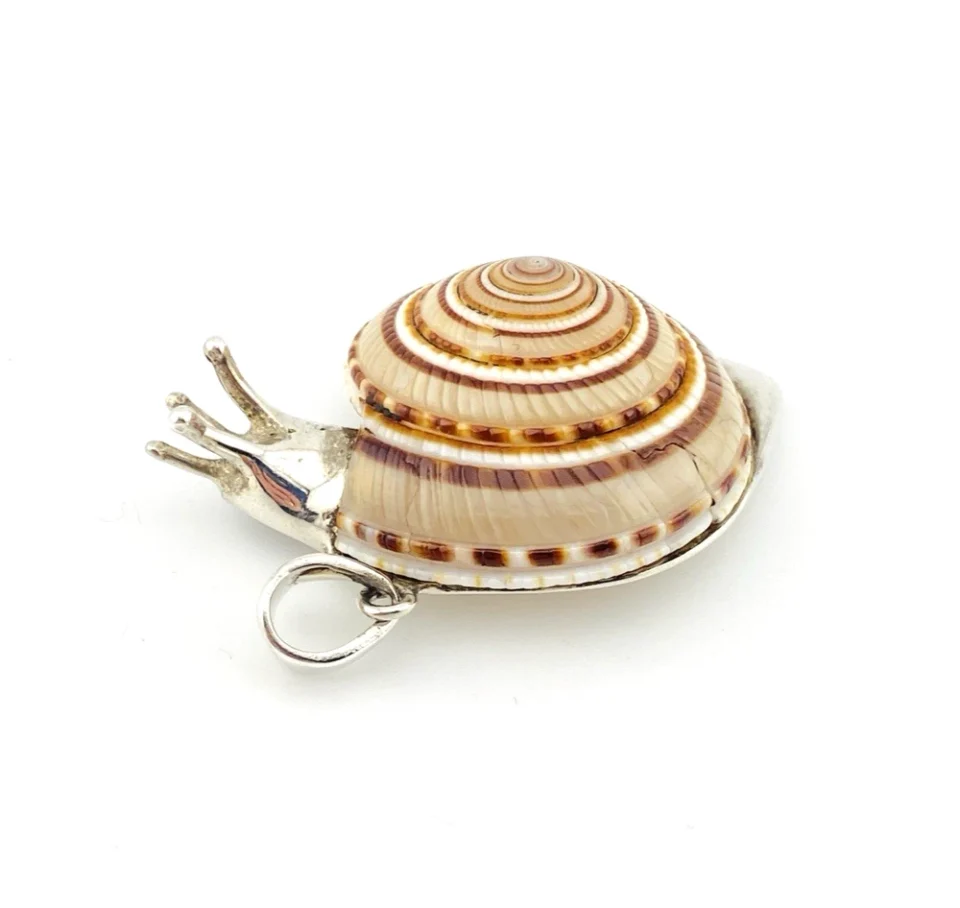 Sterling silver figural snail pendant with natural spiral shell and dimensional artisan design
