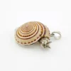 Sterling silver figural snail pendant with natural spiral shell and dimensional artisan design