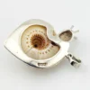 Sterling silver figural snail pendant with natural spiral shell and dimensional artisan design