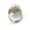 Art Deco clear cut glass sugarloaf cocktail ring with etched sunrise pattern in silver tone setting