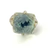 Art Deco clear cut glass sugarloaf cocktail ring with etched sunrise pattern in silver tone setting