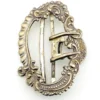 Large antique Victorian silver plated belt buckle with raised scrollwork design