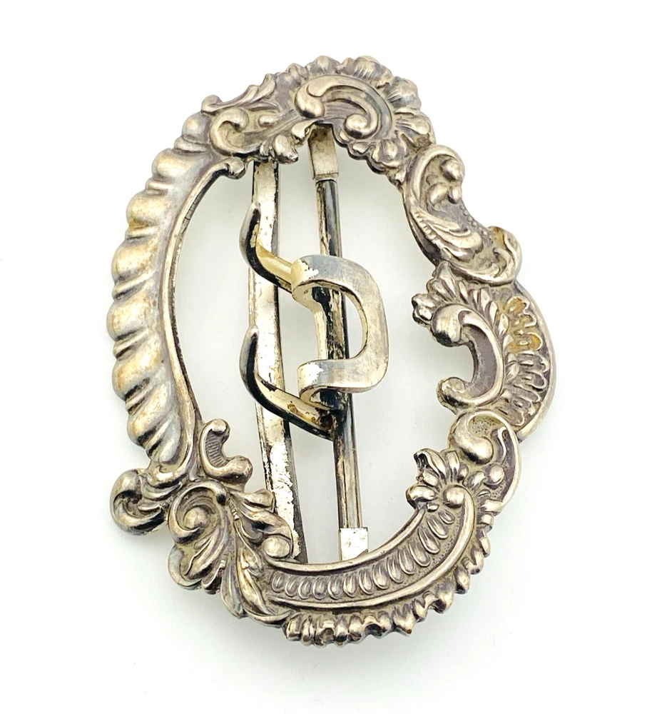 Large antique Victorian silver plated belt buckle with raised scrollwork design