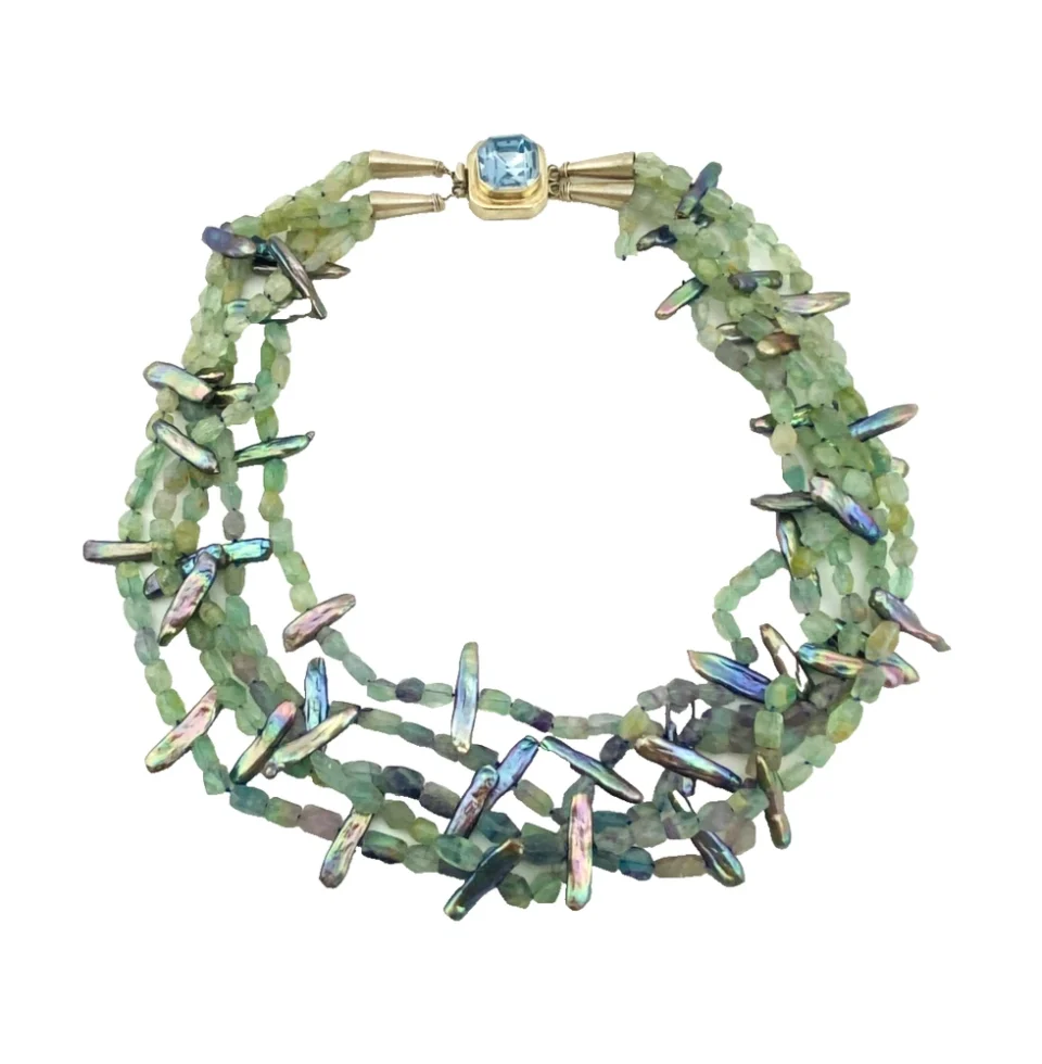 Five-strand necklace of green fluorite and iridescent peacock stick pearls with a square sterling silver clasp