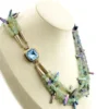Five-strand necklace of green fluorite and iridescent peacock stick pearls with a square sterling silver clasp