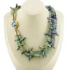 Five-strand necklace of green fluorite and iridescent peacock stick pearls with a square sterling silver clasp
