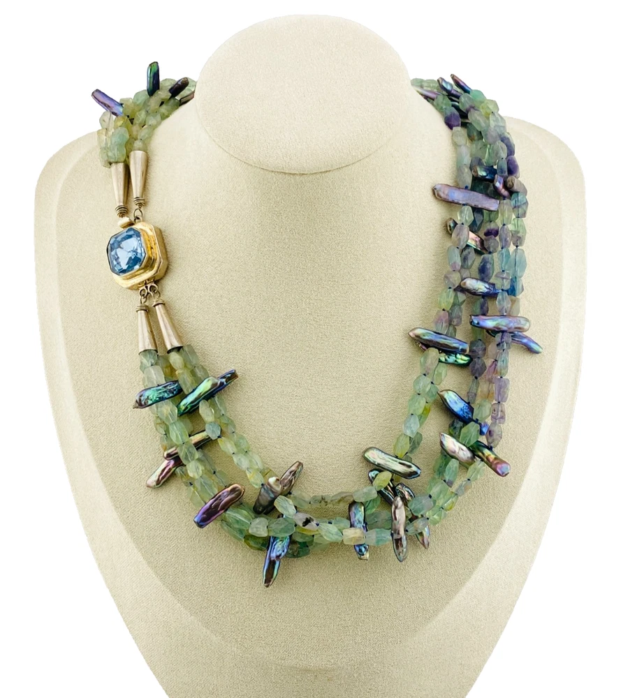 Five-strand necklace of green fluorite and iridescent peacock stick pearls with a square sterling silver clasp