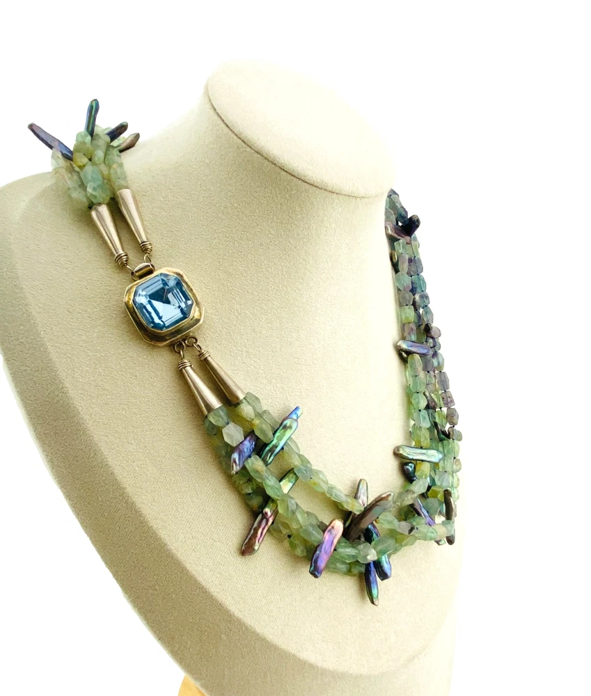 Five-strand necklace of green fluorite and iridescent peacock stick pearls with a square sterling silver clasp