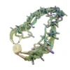 Five-strand necklace of green fluorite and iridescent peacock stick pearls with a square sterling silver clasp