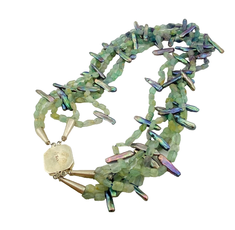 Five-strand necklace of green fluorite and iridescent peacock stick pearls with a square sterling silver clasp