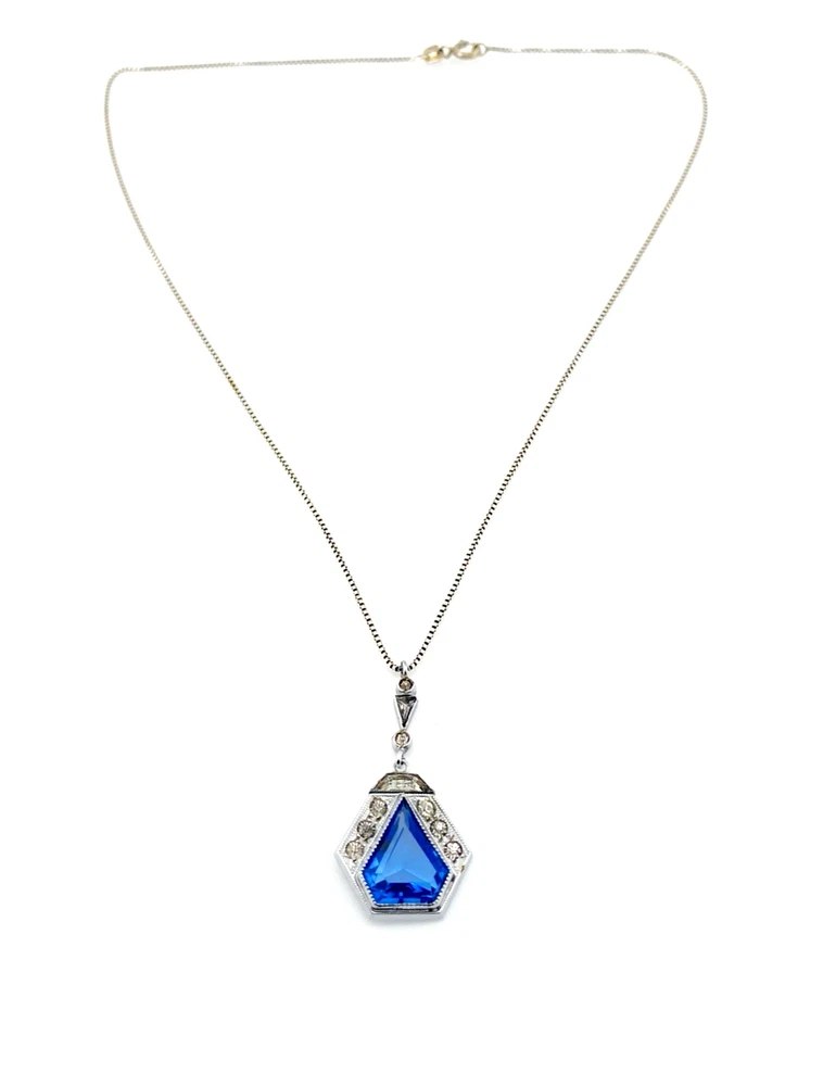Art Deco shield-form lavalier necklace with cornflower-blue glass and clear paste stones