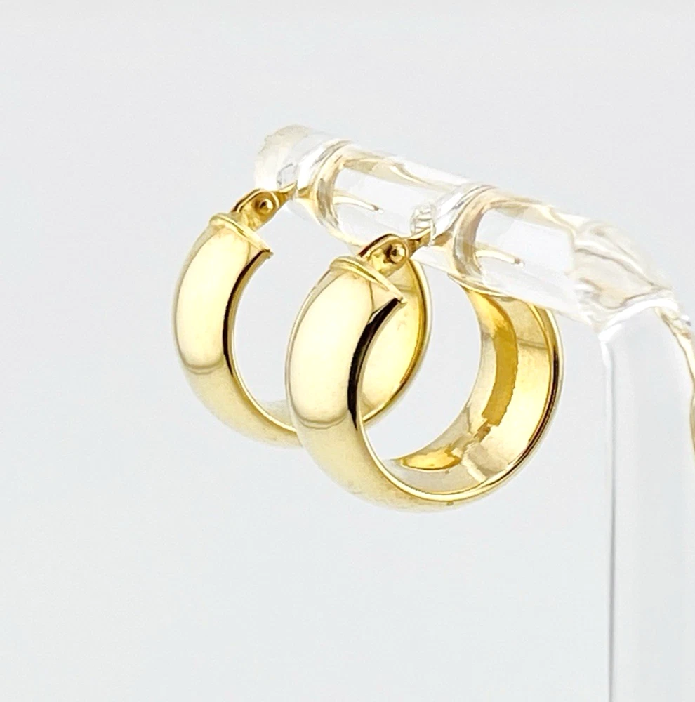 Wide polished 14K yellow gold Italian huggie hoop earrings with hinged posts