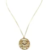 Antique Edwardian round openwork pendant necklace in warm rose gold filled with a likely natural pearl center on a 16-inch chain.