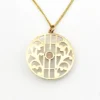 Antique Edwardian round openwork pendant necklace in warm rose gold filled with a likely natural pearl center on a 16-inch chain.