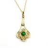 Vintage lavaliere pendant necklace with a faceted green glass stone, genuine pearl accent, and 12K gold filled chain.