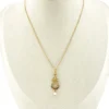 Antique Edwardian solid 9K gold lavaliere pendant with a diamond simulant center, natural baroque pearl drop, and later 12K gold filled chain.
