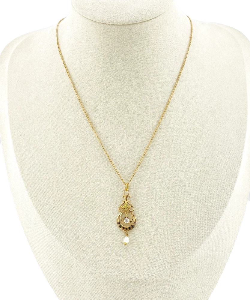Antique Edwardian solid 9K gold lavaliere pendant with a diamond simulant center, natural baroque pearl drop, and later 12K gold filled chain.