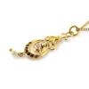 Antique Edwardian solid 9K gold lavaliere pendant with a diamond simulant center, natural baroque pearl drop, and later 12K gold filled chain.