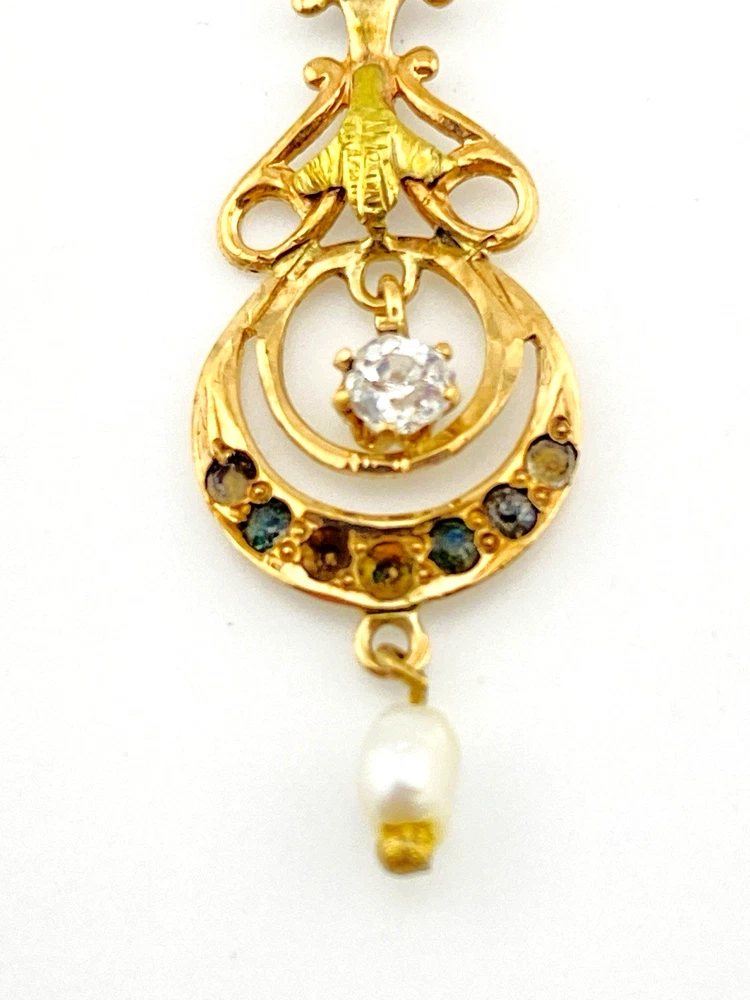 Antique Edwardian solid 9K gold lavaliere pendant with a diamond simulant center, natural baroque pearl drop, and later 12K gold filled chain.