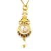 Antique Edwardian solid 9K gold lavaliere pendant with a diamond simulant center, natural baroque pearl drop, and later 12K gold filled chain.