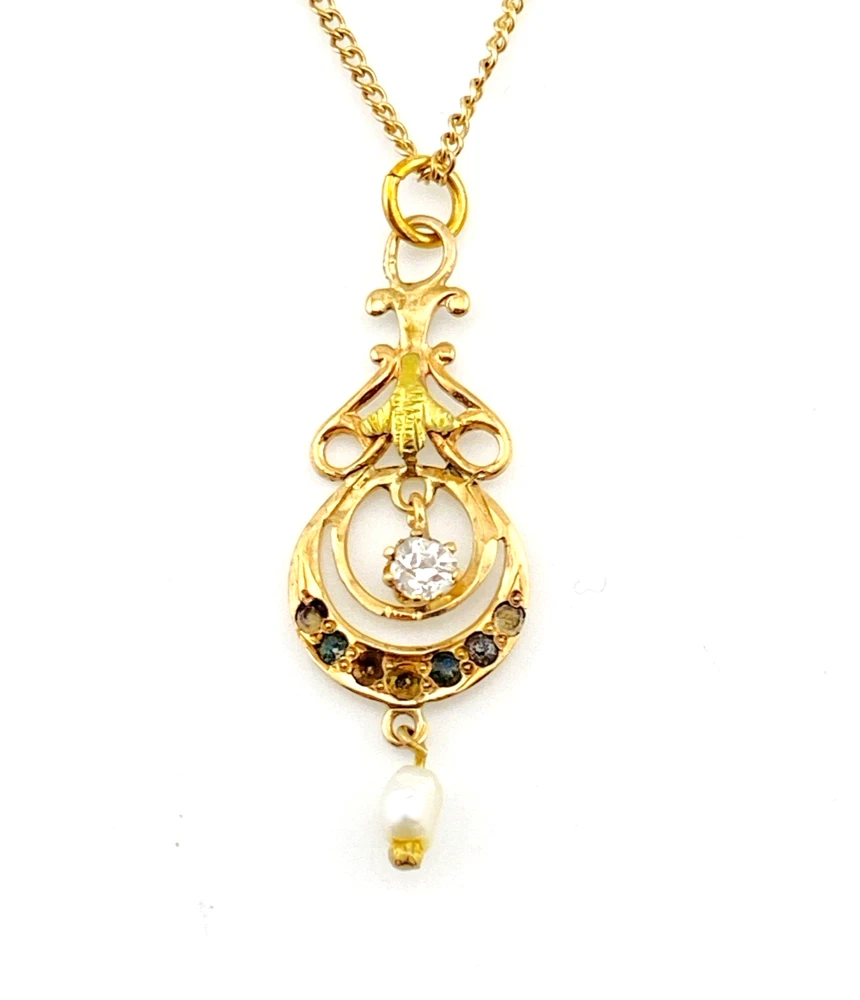 Antique Edwardian solid 9K gold lavaliere pendant with a diamond simulant center, natural baroque pearl drop, and later 12K gold filled chain.