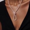 Opera length knotted pearls on model