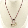 Ruby bead conversion necklace with Victorian mother-of-pearl cornucopia, garnet and antique paste ornament