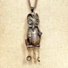 Vintage Guatemalan sterling silver owl guardapelo locket with opening body and three dangling household vessels