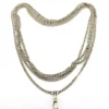 Vintage 63-inch sterling silver curb-link long guard chain with dog clip arranged in three graduated layers