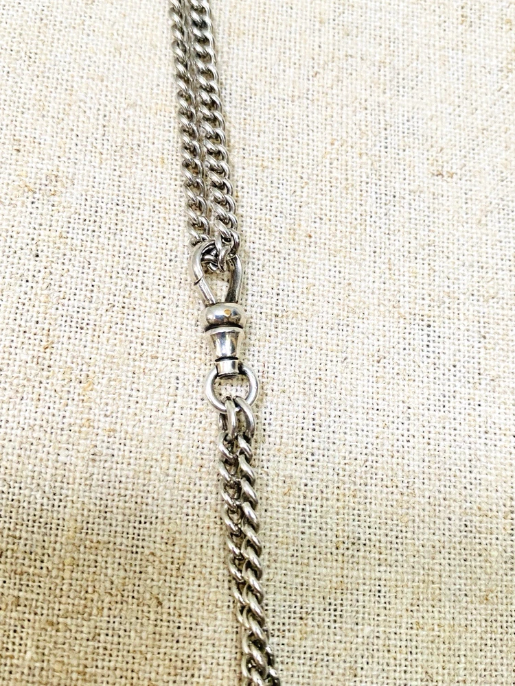 Vintage 63-inch sterling silver curb-link long guard chain with dog clip arranged in three graduated layers