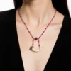 Ruby bead conversion necklace with Victorian mother-of-pearl cornucopia, garnet and antique paste ornament