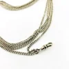 Vintage 63-inch sterling silver curb-link long guard chain with dog clip arranged in three graduated layers
