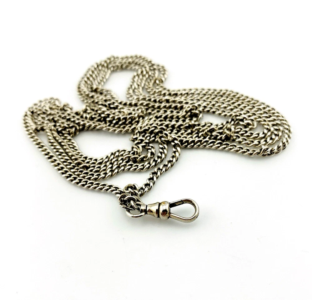 Vintage 63-inch sterling silver curb-link long guard chain with dog clip arranged in three graduated layers