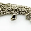 Vintage 63-inch sterling silver curb-link long guard chain with dog clip arranged in three graduated layers