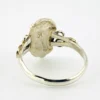 Vintage size 9.75 Southwestern sterling silver ring with teardrop turquoise, engraved leaf, scrolls, and sunburst-stamped silver drop