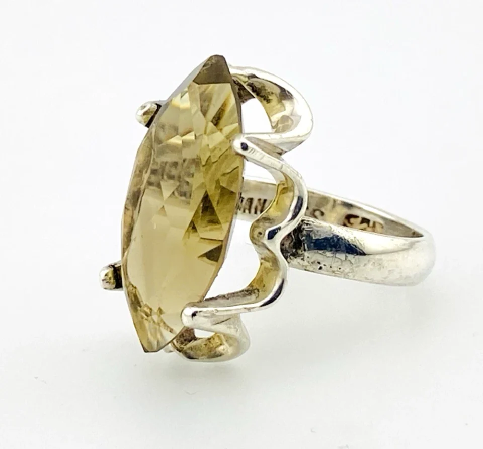 Vintage Sanches Mexican sterling silver ring with large marquise-cut smoky quartz in a sculptural open setting