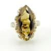 Vintage Sanches Mexican sterling silver ring with large marquise-cut smoky quartz in a sculptural open setting