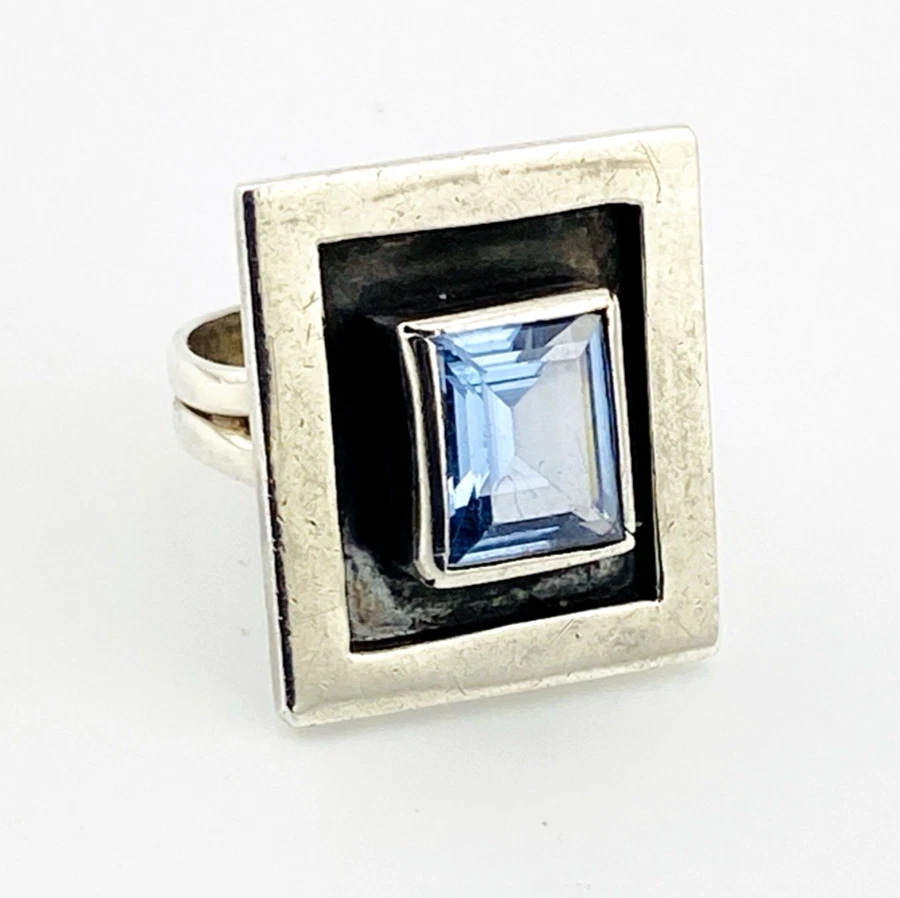Geometric sterling silver panel ring with emerald-cut Swiss blue topaz