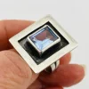 Geometric sterling silver panel ring with emerald-cut Swiss blue topaz