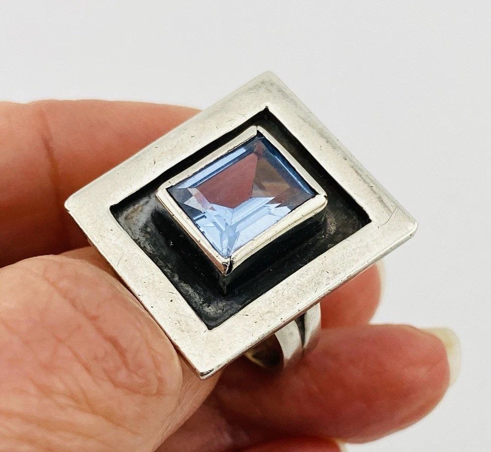 Geometric sterling silver panel ring with emerald-cut Swiss blue topaz