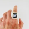 Geometric sterling silver panel ring with emerald-cut Swiss blue topaz