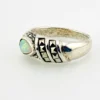 Asymmetrical sterling silver band with teardrop opal and pyramid-cut marcasites