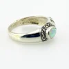 Asymmetrical sterling silver band with teardrop opal and pyramid-cut marcasites