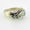 Asymmetrical sterling silver band with teardrop opal and pyramid-cut marcasites