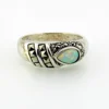 Asymmetrical sterling silver band with teardrop opal and pyramid-cut marcasites