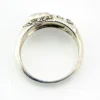 Asymmetrical sterling silver band with teardrop opal and pyramid-cut marcasites